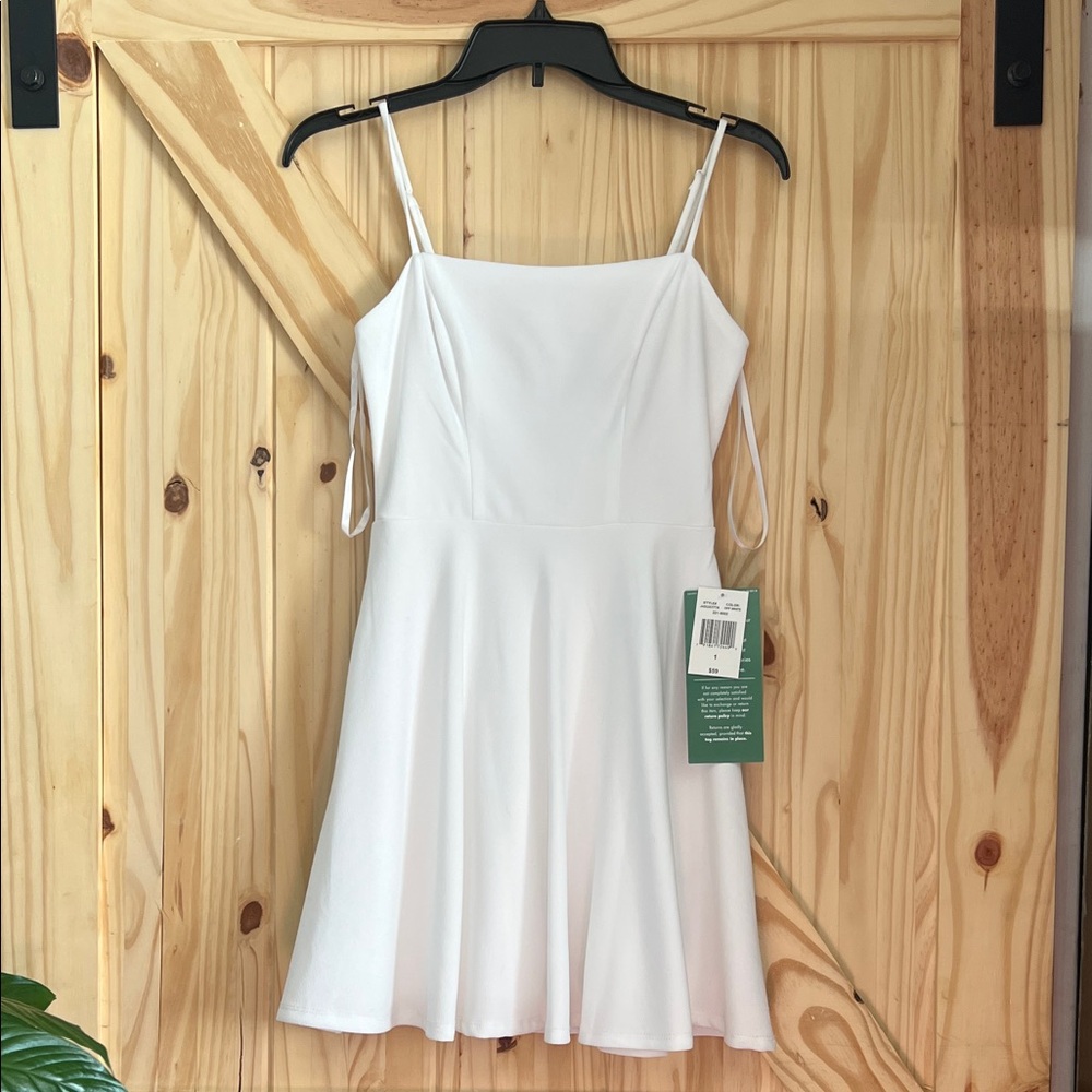 B. Smart White Mini Dress with Spaghetti Straps